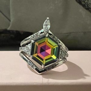 Lab created rainbow tourmaline.   Rhodium plating.    Size 7